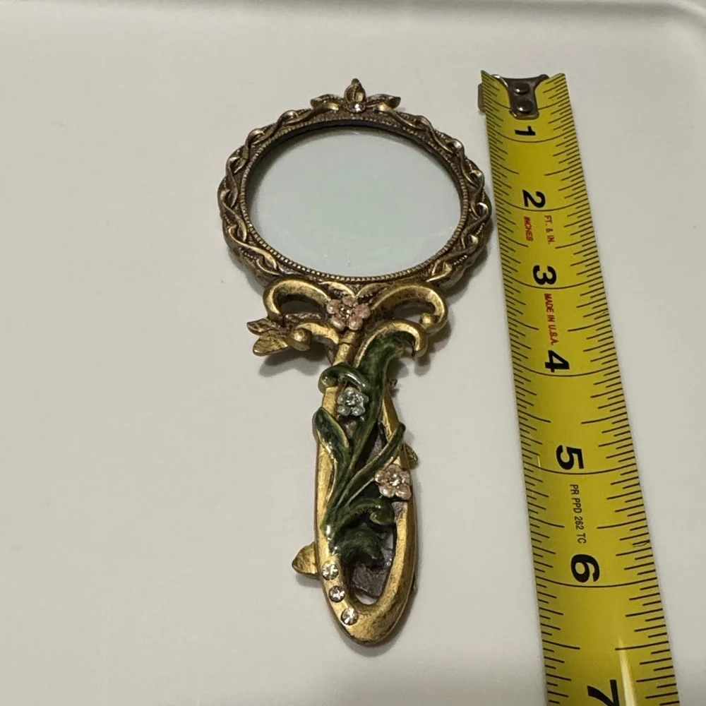 Vintage Handheld Magnifier glass with two intricate Floral Designs